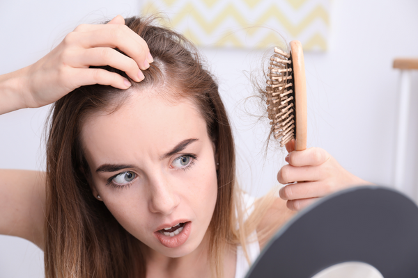Semaglutide Side Effects: Long-term Impact | Alyn MD woman with hair loss